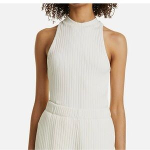 Vince Ribbed High Neck Tank Top Women's XS
Bone Solid Sleeveless Pullover